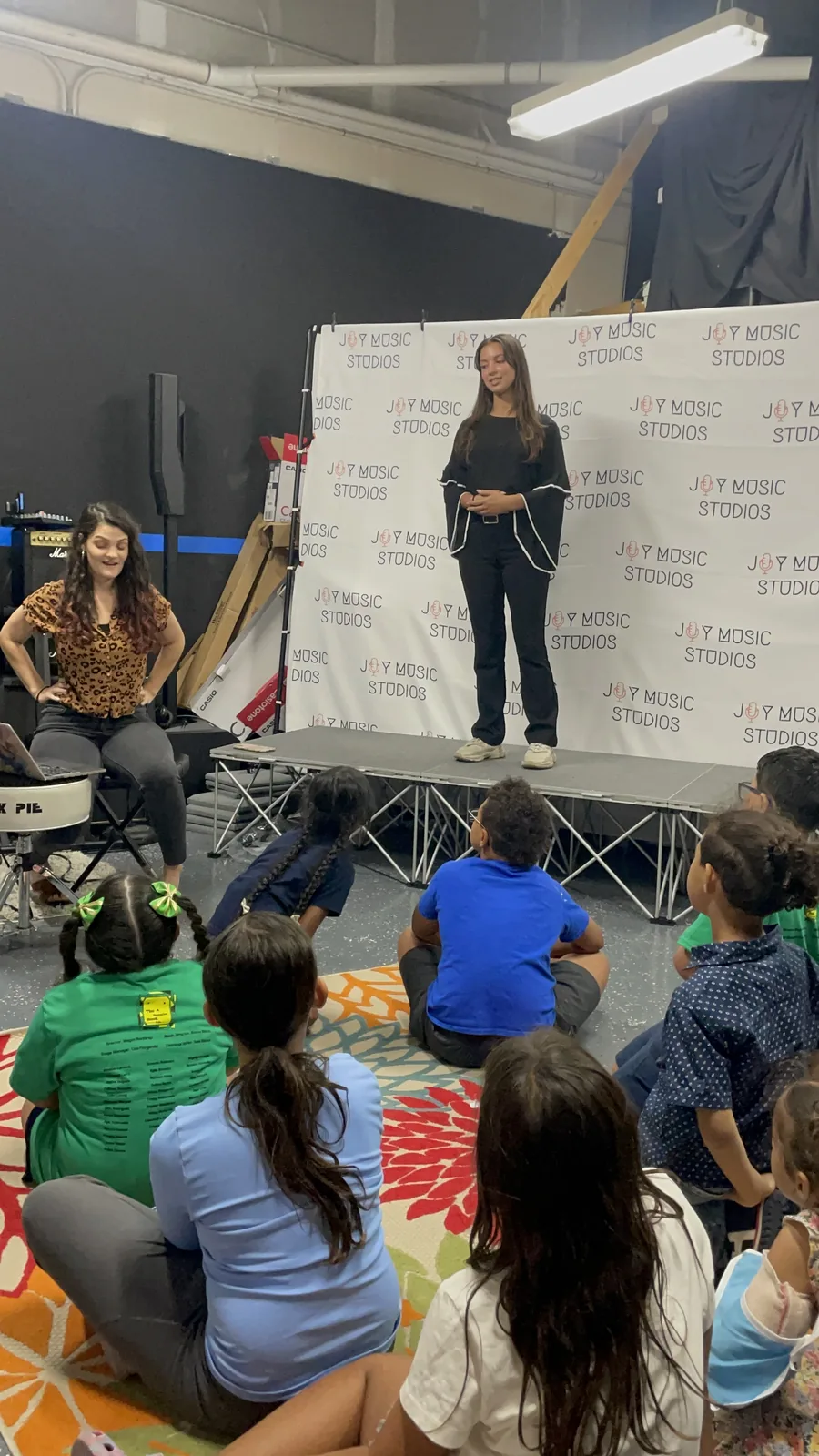 Instructor leading a lesson for a group of seated students